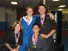 Ryan and Competition Team (Samantha, Kyle Stewart and Nathaniel Crane) at Allen Sandoval's Freestyle Karate, in a medal harvest at tournament
